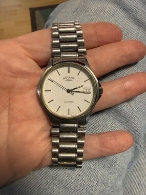 Vintage 80s Rotary Men's Swiss Quartz stainless steel watch with date
